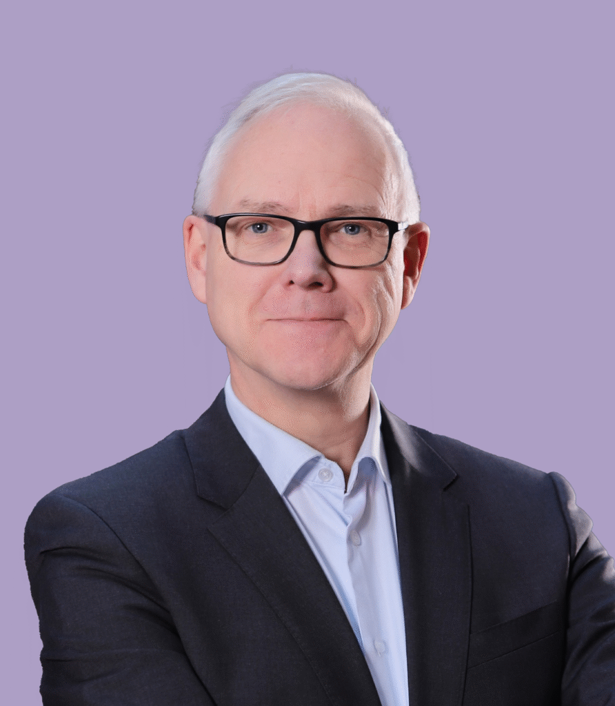 Portrait of a man in a suit and glasses