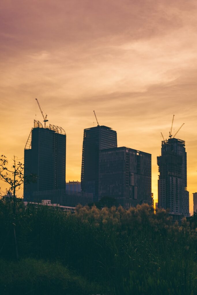 a view of a city skyline at sunset